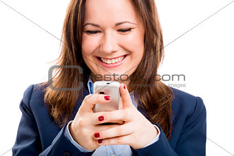 Business woman with a cellphone texting