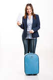 Business woman carrying a suitcase