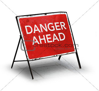Grungy road sign danger ahead