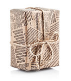 Box packaged newspaper with bow of rope