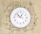Business concept drawing around wall clock