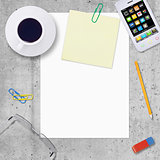 Blank paper with office work elements around