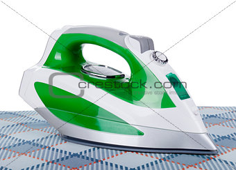 Iron on ironing board on a white background