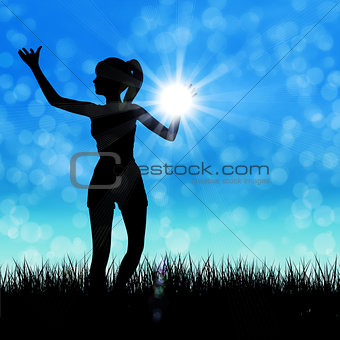 Silhouette of a girl on the meadow