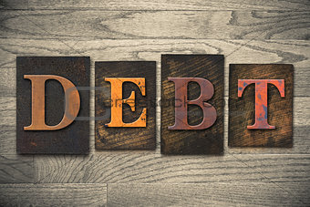 Debt Concept Wooden Letterpress Type