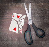 Concept of addiction, card with scissors