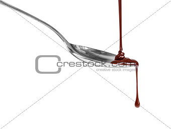 chocolate dripping from a spoon, isolated on white background