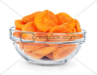 dried apricots in a glass bowl isolated on white background