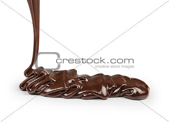 liquid chocolate draws a line on an isolated white background