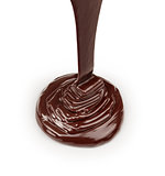 stream of dark chocolate isolated on white background