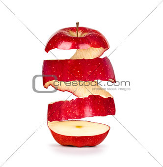 apple with the skin in a spiral on a white background