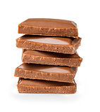 stack of pieces of milk chocolate on a white background