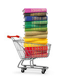 stack of colorful books in shopping card on an isolated white ba