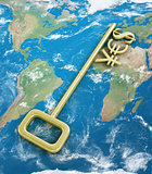 Gold currency symbols on the key with the word yes on the world.