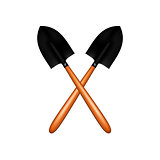 Two crossed garden shovels
