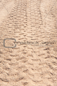 Closeup of 4x4 tyre tracks in the desert