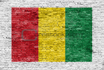 Reggae colors painted over brick wall