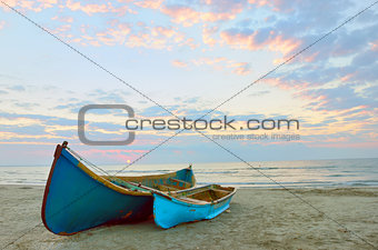 two Fishing boats and sunrise 