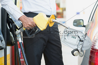 Pumping gasoline fuel 
