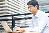 Indian businessman using laptop