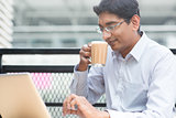 Indian businessman tea break