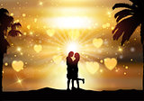 Romantic couple against a sunset sky