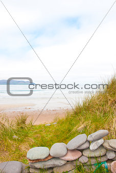 stone wall shelter on a beautiful beach
