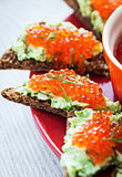 Caviar and avocado toasts