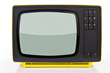 Antique yellow television.