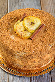 Cake with cinnamon, apples and caramel cream.