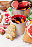 Christmas mulled wine on wooden table