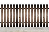 wood fence on concrete foundation