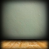 wood floor and green plaster