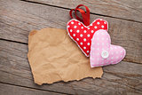 Blank old piece of paper and vintage handmaded valentines day hearts
