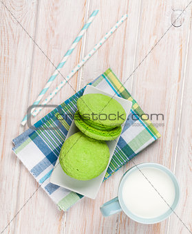 Cup of milk and macarons