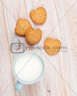 Cup of milk and heart shaped cookies