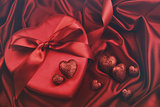 Hearts for valentines Day on satin background