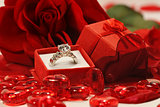 Red hearts and rose with wedding ring