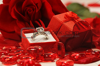 Red hearts and rose with wedding ring