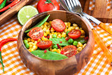 Fresh salad with corn, peas, tomato and chilli