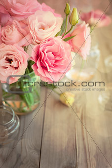 Bright vintage background with roses and bokeh