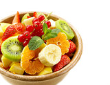 Fresh organic fruit salad (kiwi, strawberry, banana, currant, apple)
