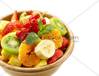 Fresh organic fruit salad (kiwi, strawberry, banana, currant, apple)