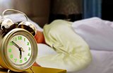Sleeping Women and Alarm Clock