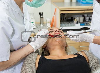 Female dentist and patient