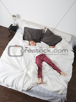 Little Girl in a big bed