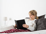 Young Girl Reading a book