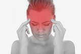 Woman suffering from severe headache
