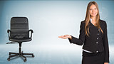 Businesswoman showing something or copyspase for product. Office chair beside