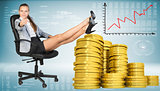 Businesswoman sitting on office chair with golden coins